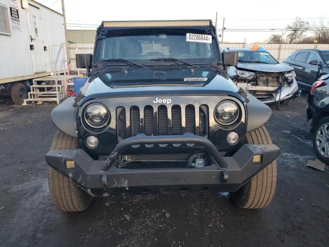 Photo 5 from auction – 2016 JEEP WRANGLER U with VIN 1C4BJWDG7GL251008