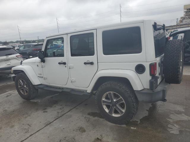 Photo 2 from auction – 2016 JEEP WRANGLER U with VIN 1C4BJWEG3GL298308
