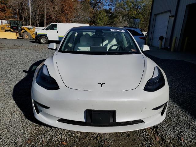 Photo 5 from auction – 2023 TESLA MODEL 3 with VIN 5YJ3E1EAXPF673282