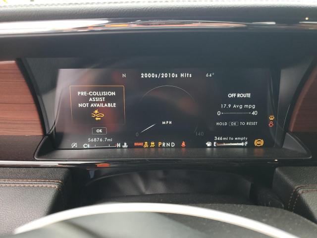 Photo 9 from auction – 2021 LINCOLN NAVIGATOR with VIN 5LMJJ2LT3MEL01558