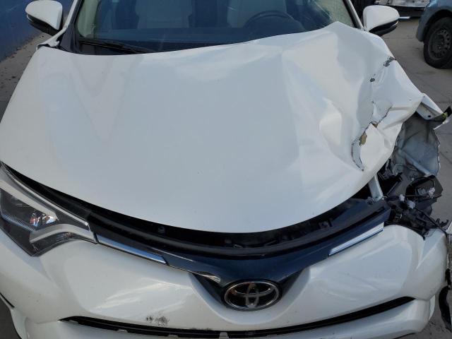 Photo 12 from auction – 2018 TOYOTA RAV4 LIMIT with VIN JTMDFREV8JJ253555