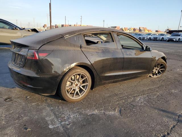 Снимка 3 от търг – 2021 TESLA MODEL 3 с VIN 5YJ3E1EB4MF068131