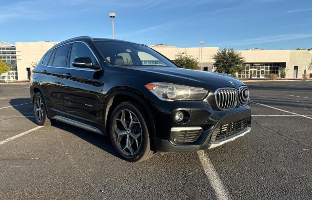 BMW X1 XDRIVE2 2016 with VIN WBXHT3C33G5E54263 - Photo from auction
