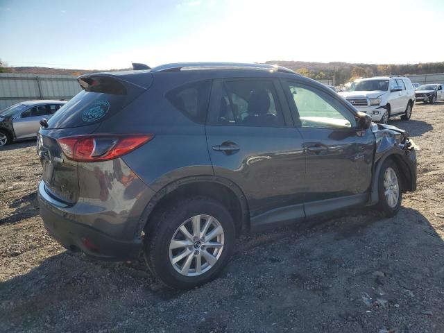 Photo 3 from auction – 2014 MAZDA CX-5 TOURI with VIN JM3KE4CY1E0351212
