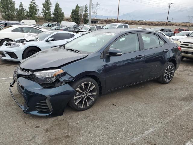 TOYOTA COROLLA L 2019 with VIN 5YFBURHE2KP924384 - Photo from auction