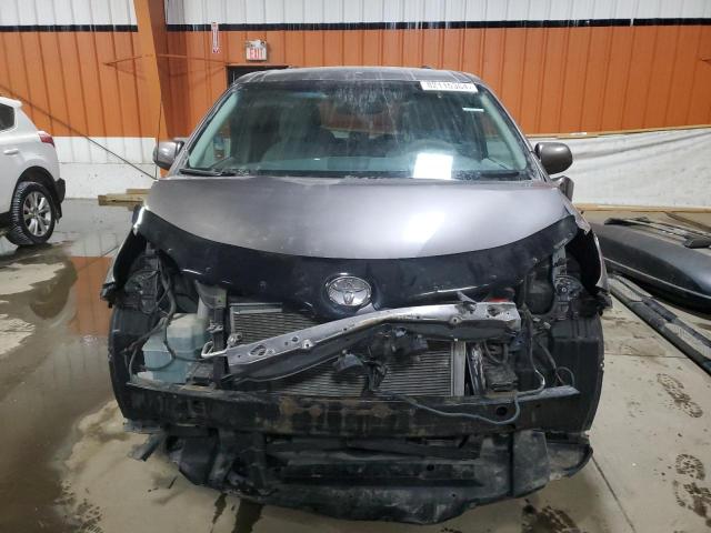 Photo 5 from auction – 2014 TOYOTA SIENNA LE with VIN 5TDKK3DC5ES446111