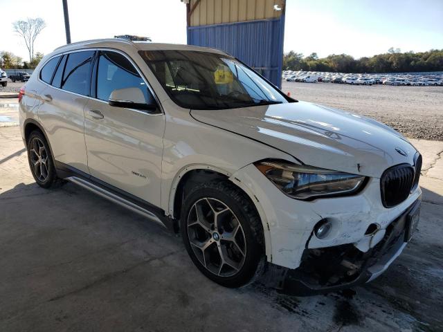 Photo 4 from auction – 2016 BMW X1 XDRIVE2 with VIN WBXHT3C34G5E53879