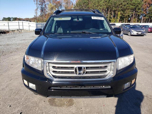 Photo 5 from auction – 2013 HONDA RIDGELINE with VIN 5FPYK1F51DB018138