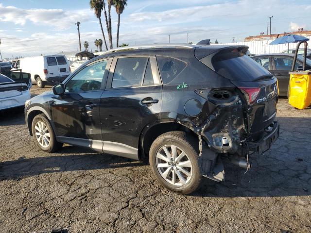 Photo 2 from auction – 2015 MAZDA CX-5 TOURI with VIN JM3KE2CY2F0545477