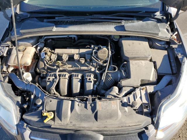 Photo 11 from auction – 2014 FORD FOCUS SE with VIN 1FADP3F25EL461083