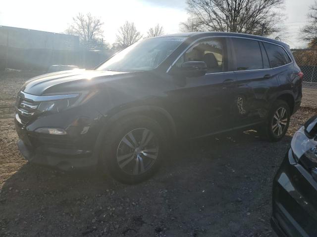 HONDA PILOT EXL 2016 with VIN 5FNYF6H68GB109878 - Photo from auction