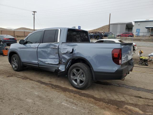 Photo 2 from auction – 2023 HONDA RIDGELINE with VIN 5FPYK3F77PB042820
