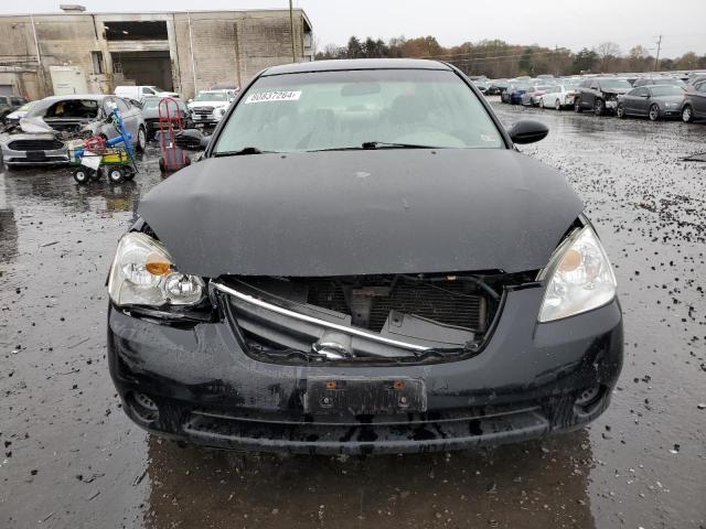 Photo 5 from auction – 2004 NISSAN ALTIMA BAS with VIN 1N4AL11D24C115681