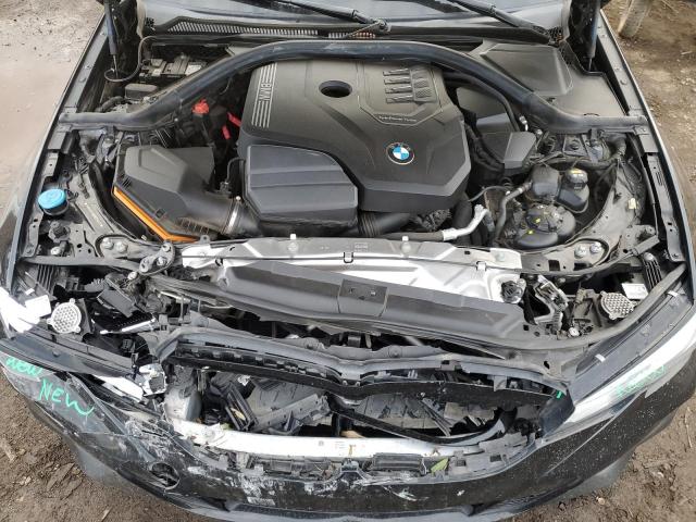 Photo 11 from auction – 2021 BMW 330I with VIN 3MW5R1J00M8B95462
