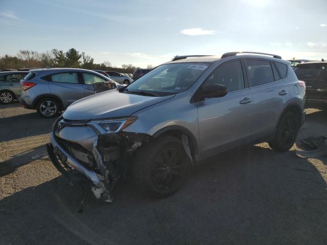 TOYOTA RAV4 LE 2018 with VIN JTMBFREV8JJ211197 - Photo from auction