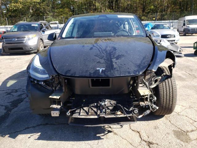 Photo 5 from auction – 2024 TESLA MODEL Y with VIN 7SAYGDED0RF004357