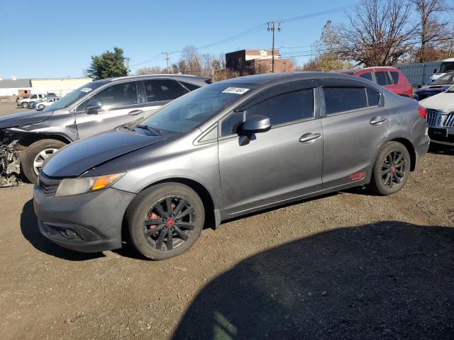 HONDA CIVIC EXL 2012 with VIN 2HGFB2F9XCH598671 - Photo from auction