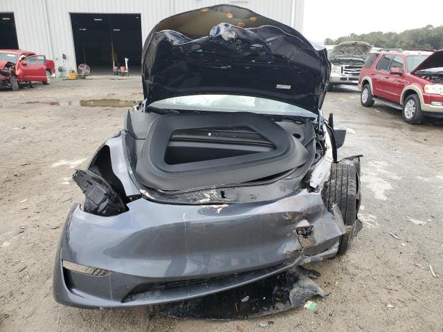 Photo 5 from auction – 2023 TESLA MODEL Y with VIN 7SAYGAEE4PF966567