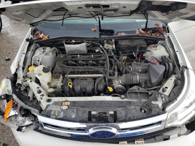 Photo 11 from auction – 2009 FORD FOCUS S with VIN 1FAHP34N59W223009