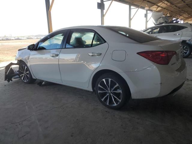 Photo 2 from auction – 2018 TOYOTA COROLLA L with VIN 5YFBURHE8JP820643