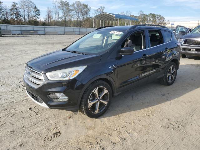 FORD ESCAPE SE 2017 with VIN 1FMCU0GD3HUC72407 - Photo from auction