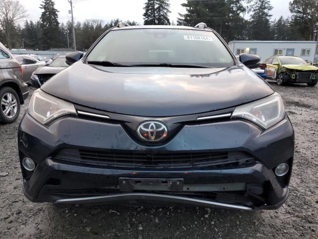 Photo 5 from auction – 2017 TOYOTA RAV4 XLE with VIN JTMRFREV0HJ708883