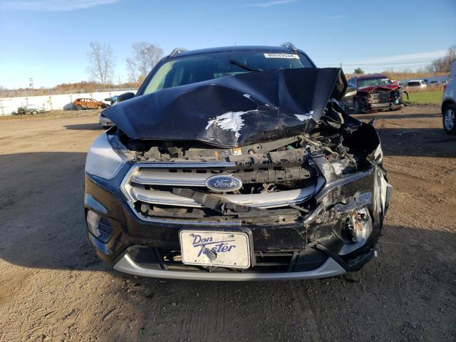 Photo 5 from auction – 2019 FORD ESCAPE TIT with VIN 1FMCU9J96KUB42170