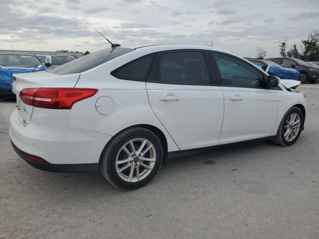 Photo 3 from auction – 2016 FORD FOCUS SE with VIN 1FADP3F21GL376972