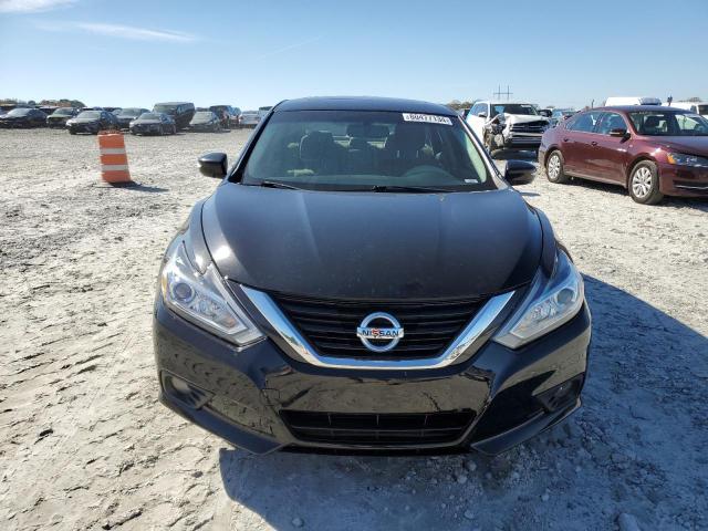 Photo 5 from auction – 2016 NISSAN ALTIMA 2.5 with VIN 1N4AL3AP1GC266666