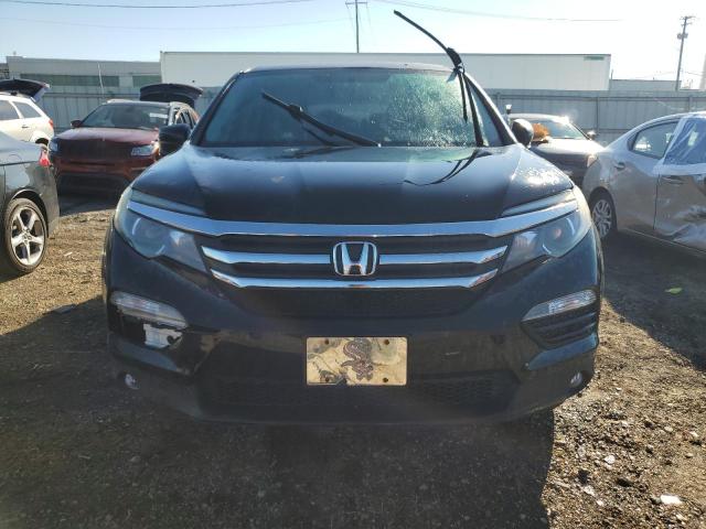 Photo 5 from auction – 2016 HONDA PILOT EXL with VIN 5FNYF6H55GB012385