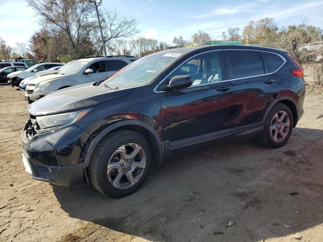 HONDA CR-V EXL 2018 with VIN 7FARW2H89JE017799 - Photo from auction
