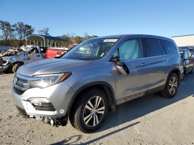 HONDA PILOT EXL 2016 with VIN 5FNYF5H5XGB033260 - Photo from auction
