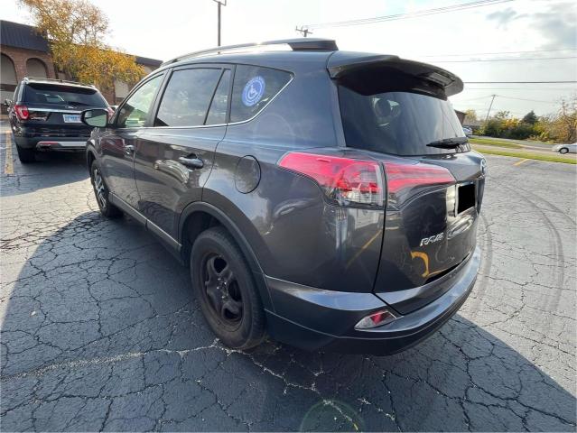 Photo 3 from auction – 2018 TOYOTA RAV4 LE with VIN JTMBFREV3JJ209390