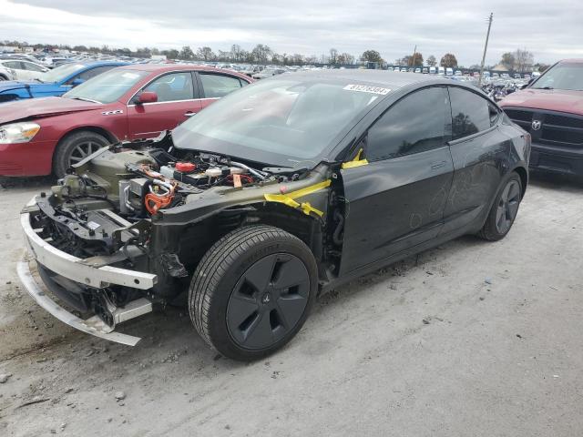 TESLA MODEL 3 2021 with VIN 5YJ3E1EBXMF869517 - Photo from auction