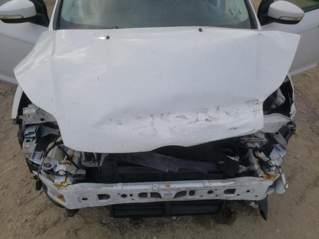 Photo 11 from auction – 2014 FORD FOCUS SE with VIN 1FADP3F2XEL313687