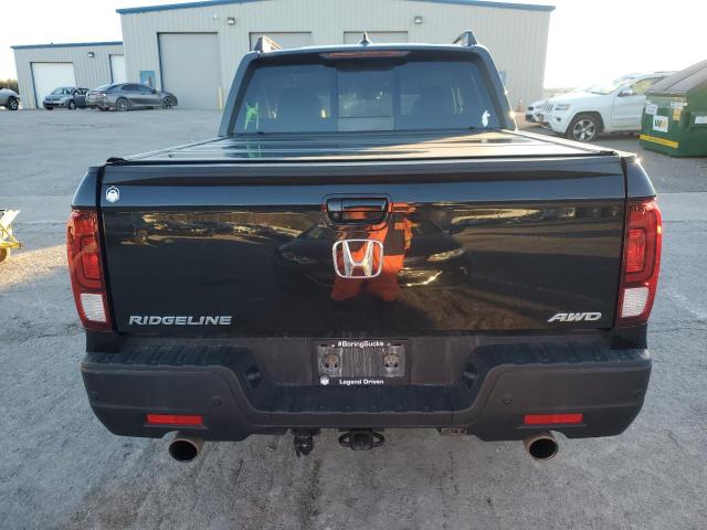 Photo 6 from auction – 2021 HONDA RIDGELINE with VIN 5FPYK3F72MB026746