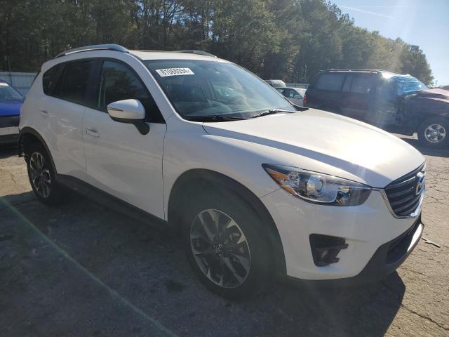 Photo 4 from auction – 2016 MAZDA CX-5 GT with VIN JM3KE2DY8G0815358