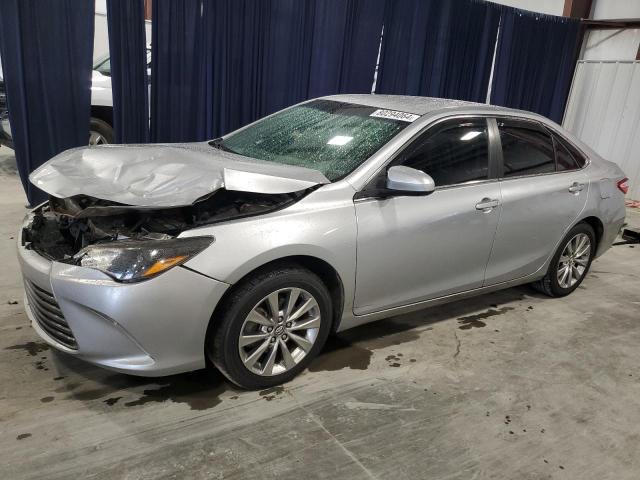 TOYOTA CAMRY LE 2017 with VIN 4T1BF1FKXHU736305 - Photo from auction