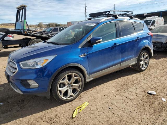 FORD ESCAPE TIT 2019 with VIN 1FMCU9J91KUC29670 - Photo from auction