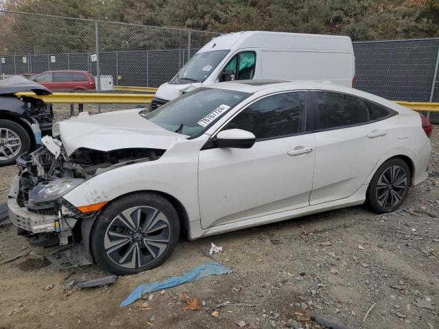 HONDA CIVIC EXL 2017 with VIN 19XFC1F74HE211295 - Photo from auction