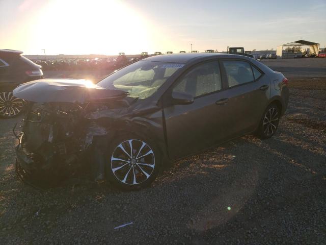 TOYOTA COROLLA L 2017 with VIN 5YFBURHE5HP587282 - Photo from auction