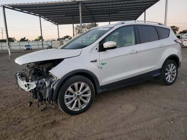 FORD ESCAPE TIT 2017 with VIN 1FMCU0JD4HUE74116 - Photo from auction