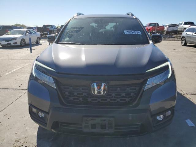 Photo 5 from auction – 2021 HONDA PASSPORT E with VIN 5FNYF8H04MB034700