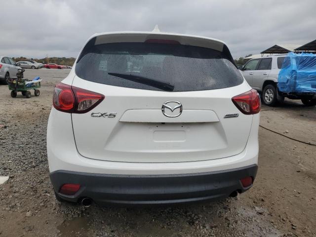 Photo 6 from auction – 2016 MAZDA CX-5 TOURI with VIN JM3KE2CY5G0619525