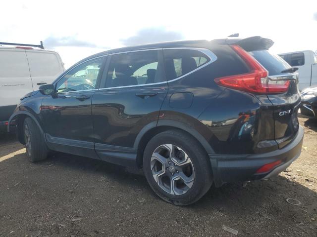 Photo 2 from auction – 2018 HONDA CR-V EX with VIN 7FARW1H57JE011337