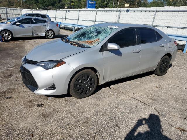 TOYOTA COROLLA L 2019 with VIN 5YFBURHE7KP875957 - Photo from auction