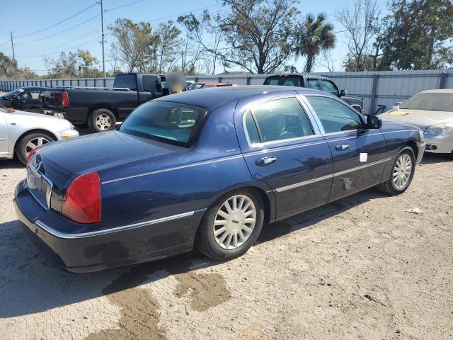 Photo 3 from auction – 2004 LINCOLN TOWN CAR E with VIN 1LNHM81W44Y633015