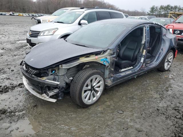 TESLA MODEL 3 2022 with VIN 5YJ3E1EB9NF166797 - Photo from auction