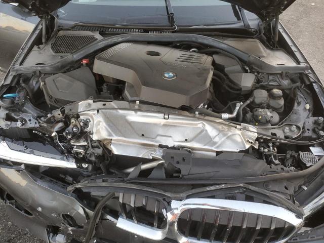 Photo 11 from auction – 2021 BMW 330I with VIN 3MW5R1J08M8B74598