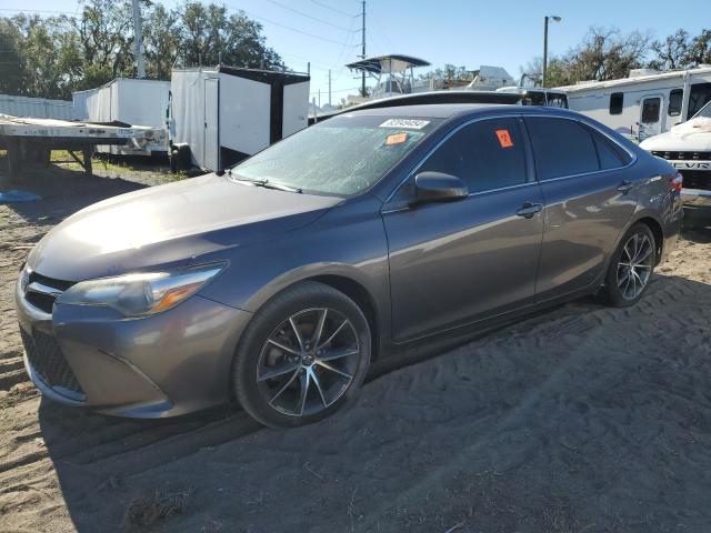 TOYOTA CAMRY LE 2016 with VIN 4T1BF1FK1GU585658 - Photo from auction